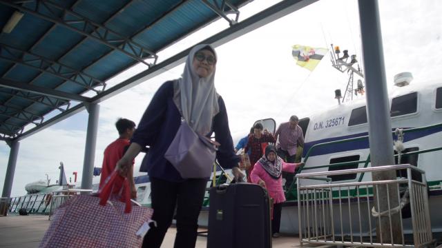 Woman getting off a ferry