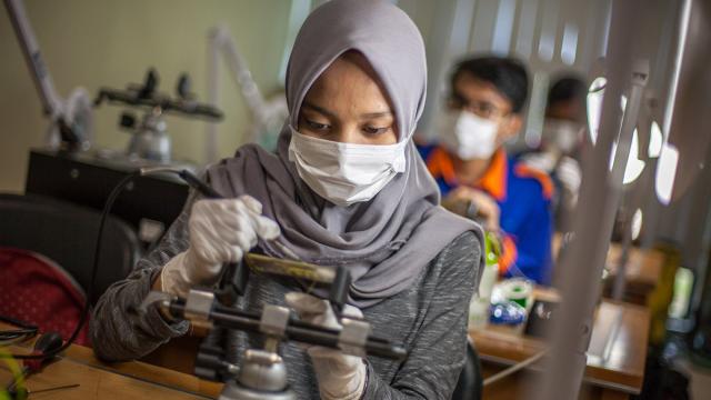 Electronics engineering students of Batam State Polytechnic design their own printed circuit boards at one of the campus' numerous electronics labs